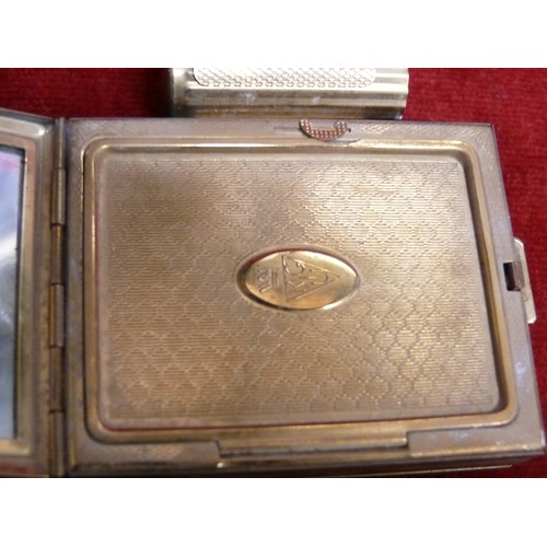 35 - A VINTAGE GOLD PLATED KIGU LADIES HAND BAG SET COMPACT, LIP STICK HOLDER, MIRROR AND CIGARETTE CASE ... 