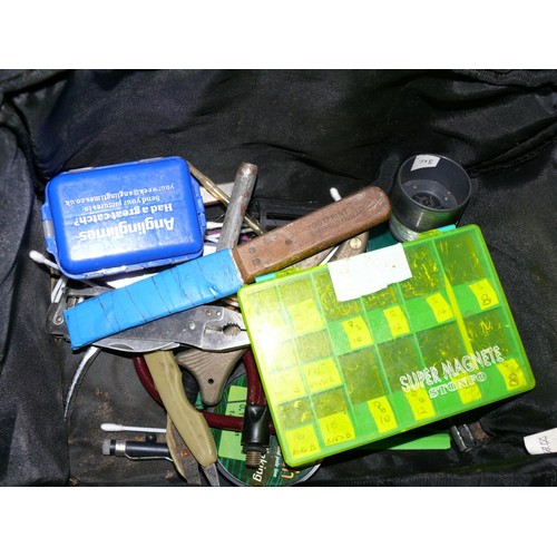 148 - FISHING ACCESSORIES CONTAINED IN A GREEN SMALL CARRY CASE WITH MULTI POCKETS, TOOLS HOOKS LINE AND M... 