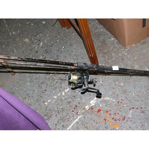 150 - DAIWA LIGHTNING GRAPHITE COIL FISHING ROD AND CRIVIT REEL. 2M LONG IN 2 PIECES.