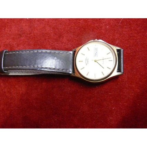 43 - A FINE ROTARY WATCH WITH DATE AND DAY HARDLY WORN