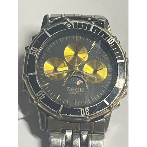 49 - A GENTS  ZEON CHRONOGRAPH TECHYMETER WATCH WITH DAY DATE AND MOON CIRCLE