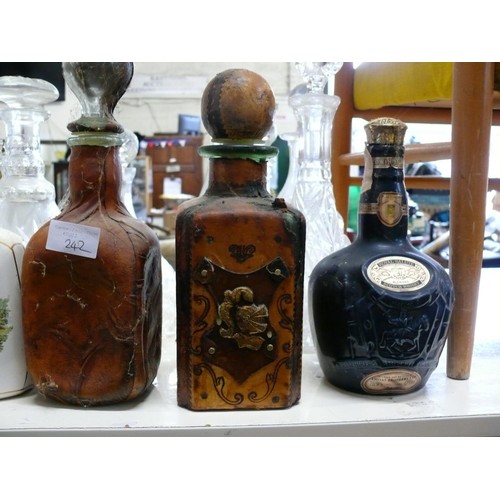 93 - 5 MIXED DECANTERS - LEATHER, CHINA ETC