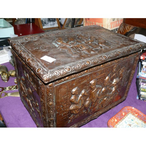 134 - AN USUSUAL COPPER CLAD TINDER BOX WITH HEAVY RELIEF ART OF TAVERN SCENES OF DRINKING, DANCING AND A ... 