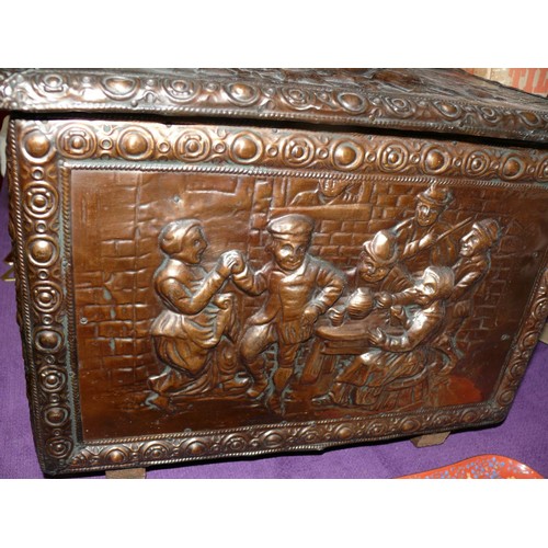 134 - AN USUSUAL COPPER CLAD TINDER BOX WITH HEAVY RELIEF ART OF TAVERN SCENES OF DRINKING, DANCING AND A ... 