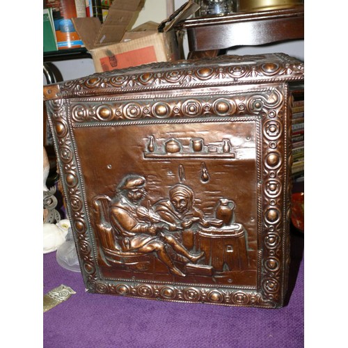 134 - AN USUSUAL COPPER CLAD TINDER BOX WITH HEAVY RELIEF ART OF TAVERN SCENES OF DRINKING, DANCING AND A ... 