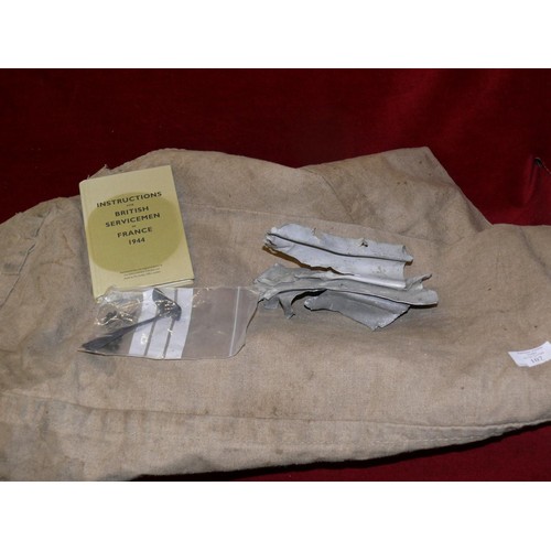 107 - GERMAN NUMBERED AIRCRAFT PART FROM CRASHED PLANE, WWII KITBAG PLUS  INSTRUCTIONS FOR BRITISH SERVICM... 