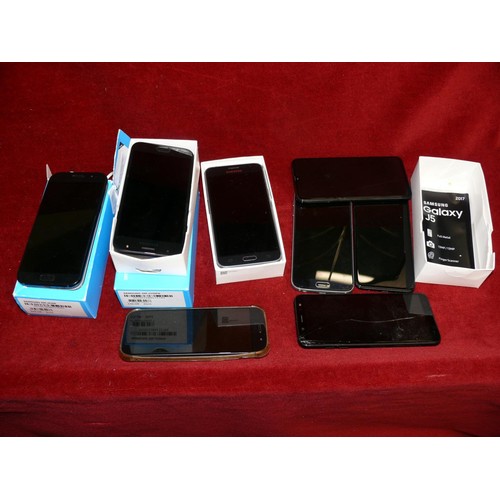 24 - A COLLECTION OF GALAXY MOBILE PHONES