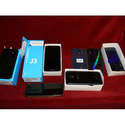 24 - A COLLECTION OF GALAXY MOBILE PHONES