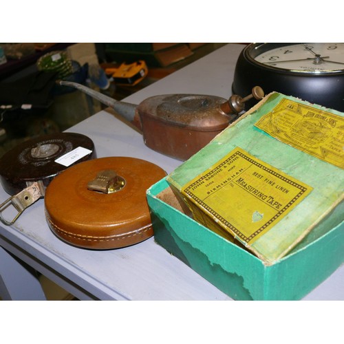 485 - CHESTERMAN BAKELITE TAPE MEASURE, A RABONE TAPE MEASURE IN LEATHER CASE, AND A VINTAGE OIL CAN