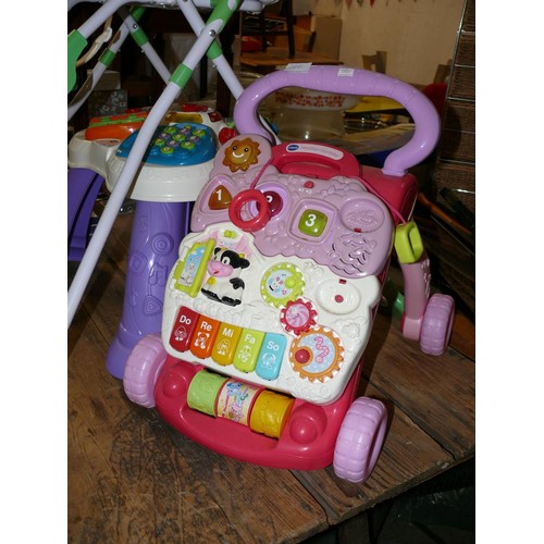 286 - BABIES HIGHCHAIR WITH GREEN SPOTS, ACTIVITY TABLE AND ACTIVITY WALKER