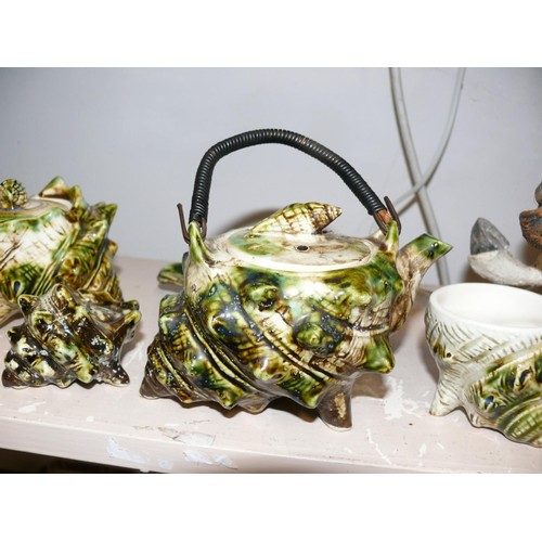 74 - MAJOLICA  CONCH SHELL DESIGN TEAPOT, SUGAR AND CREAMER PLUS PEPPER POT, CUP AND DISH