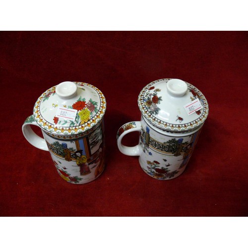 81 - PAIR OF CHINESE TEA MUGS WIH INFUSER AND LID