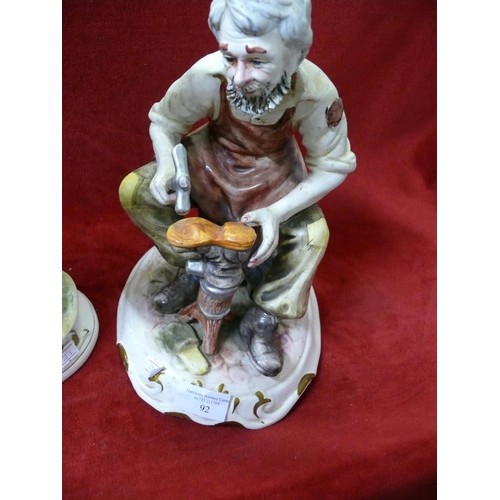 92 - CAPODIMONTE FIGURE WITH SPADE AND A CAPODIMONTE SHOE MAKER, BOTH GOOD CONDITION