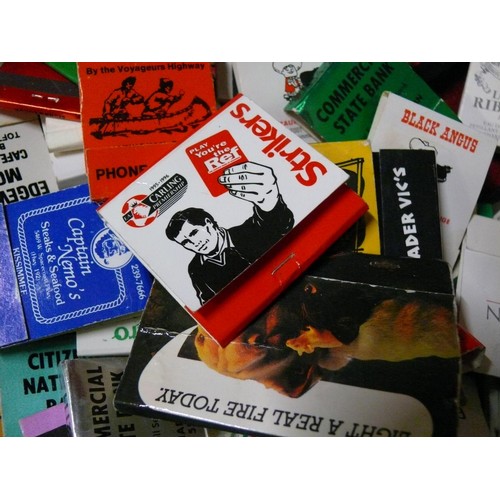 131 - TIN OF ADVERTISING BOOKS OF MATCHES,