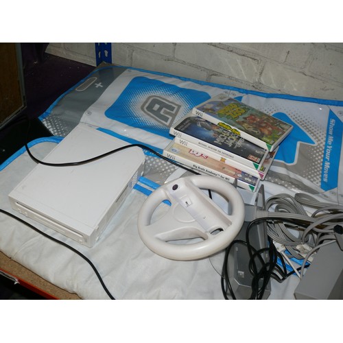 190 - NINTENDO Wii WITH GAMES, CONTROLLERS, DANCE MAT, STEERING WHEEL ETC