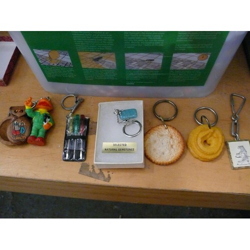 279 - TUB OF VARIOUS COLLECTABLE RETRO KEYRINGS