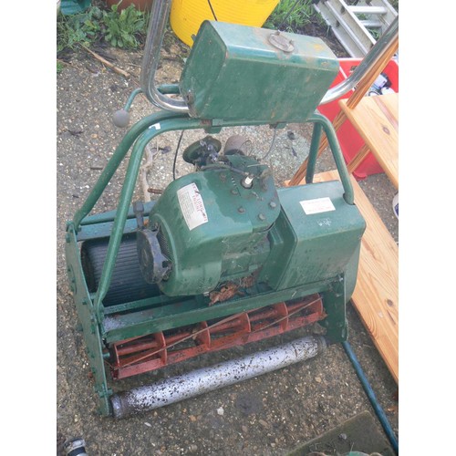 515 - A 24 INCH CUT VINTAGE PETROL MOWER IT DOES RUN BUT IS FOR SPARES OR REPAIR.