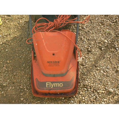 544 - FLYMO HOVERVAC HV 3000 WITH BOX AND A FLYMO MICRO LITE MOWER.