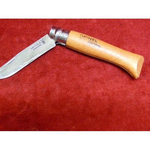 48 - A French Opinel Carbone folding hunting knife, along with an early 20thC Naval yachtsmans knife with... 