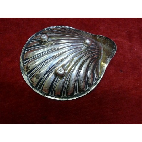 51 - Hallmarked silver shell dish (Birmingham), salt spoon (Sheffield) along with plated Nevada silver su... 