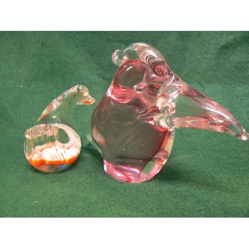 1 - Vintage cranberry coloured art glass bird paperweight, along with a smaller Murano glass bird paperw... 