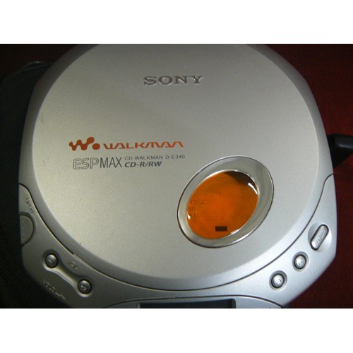 11 - Sony CD walkman with case, with Philips over ear headphones and yurbuds earphones.