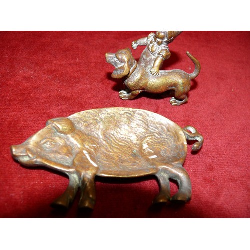 17 - Vintage brass pig tray, along with a brass model of a child with sausage dog/dachshund.