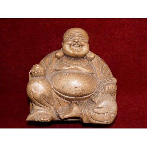 64 - CARVED WOODEN BUDDHA