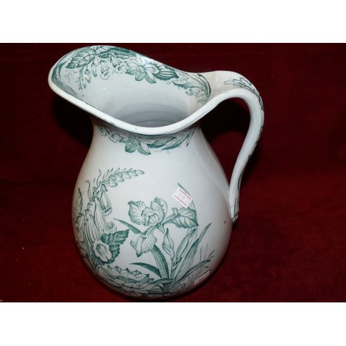 142 - A PORTMEIRION BOTANIC GARDEN JUG PLUS A LARGE TRANSFERWARE JUG