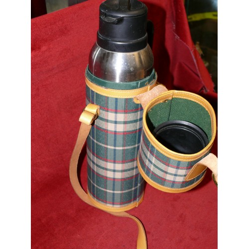 61 - NISSAN FLASK IN REAL LEATHER TARTAN CASE PLUS A FAUX LEATHER BOTTLE CADDY