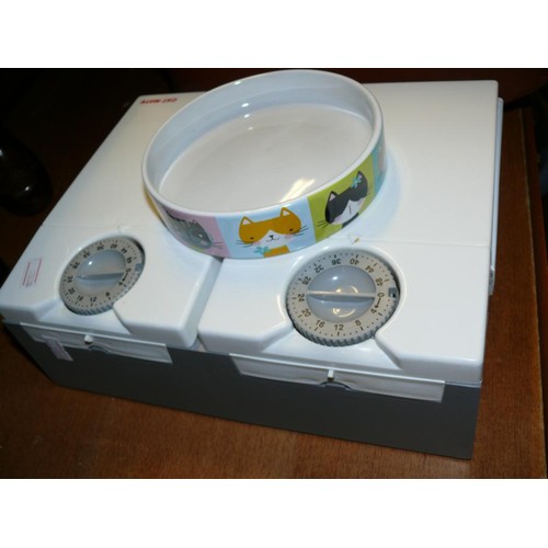 214 - CATMATE FEEDING STATION AND A NICE CHINA FEEDING BOWL