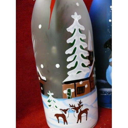 102 - 2 X 29CM LIT CHRISTMAS DECORATION BOTTLES 1 WITH HOUSE DECORATION AND 1 WITH SNOWMAN DECORATION