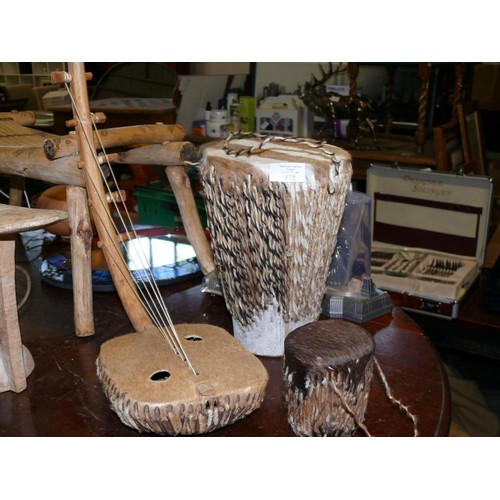 172 - 3 AFRICAN HIDE INSTRUMENTS 2 DRUMS AND AN ARCHED HARP