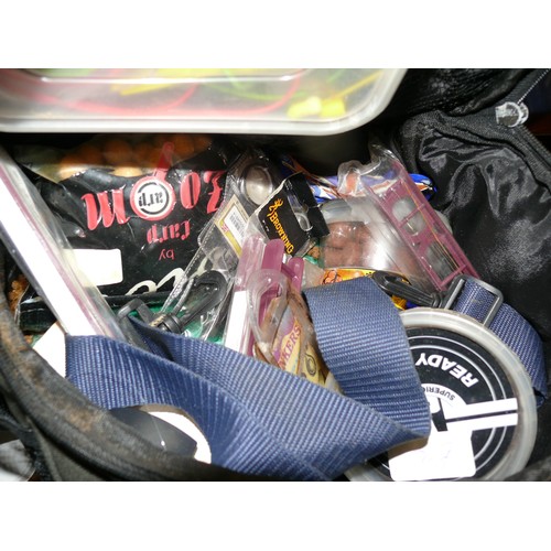 184 - NICE SELECTION OF FISHING ITEMS IN CARRY BAG