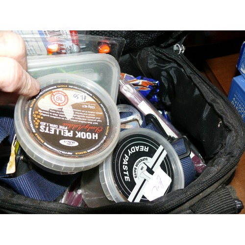 184 - NICE SELECTION OF FISHING ITEMS IN CARRY BAG