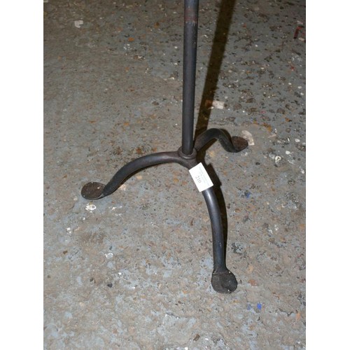 210 - METAL TRI LEGGED CANDLE HOLDER AND LARGE CANDLE