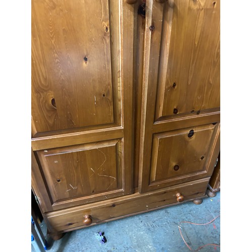 410 - ANOTHER PINE DOUBLE WARDROBE WITH PANELLED DOORS AND DRAWER BELOW