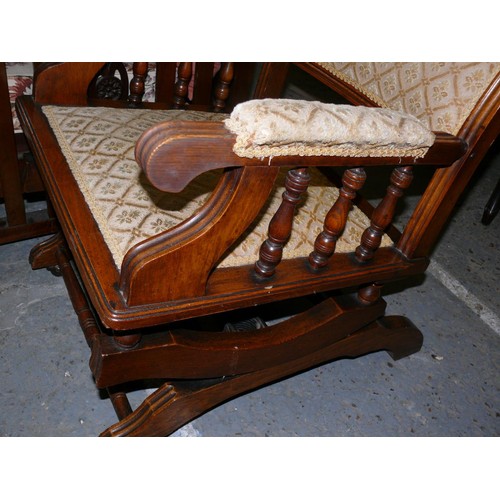 432 - Early 20thC oak American rocker chair with turned spindles and stretchers. Woven floral ivory colore... 