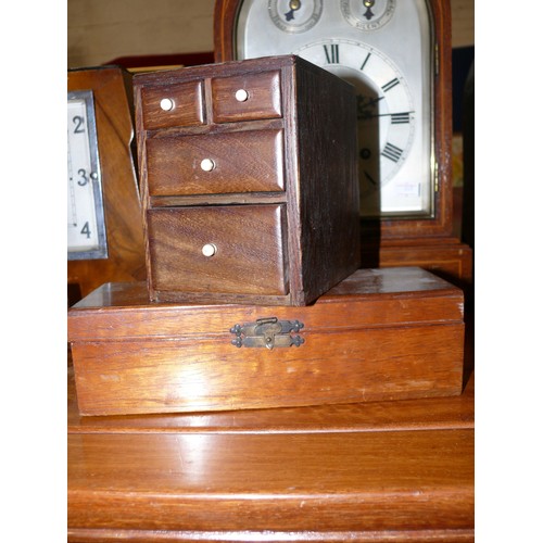 323 - A miniature set of wooden drawers, together with a mahogany hinged box.