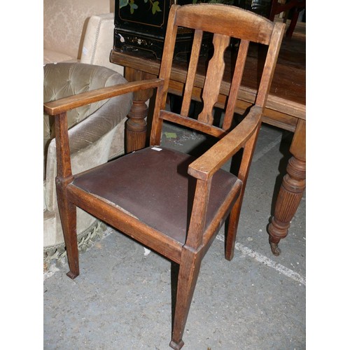 434 - Early 20thC oak slat back carver chair.