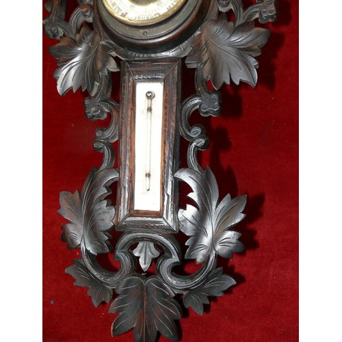 315 - Antique Black Forest style carved barometer & thermometer.