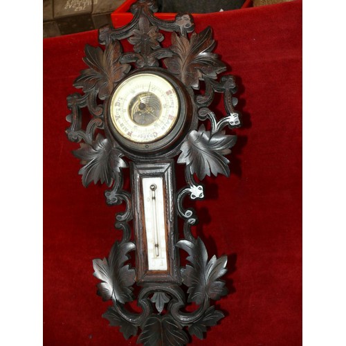 315 - Antique Black Forest style carved barometer & thermometer.