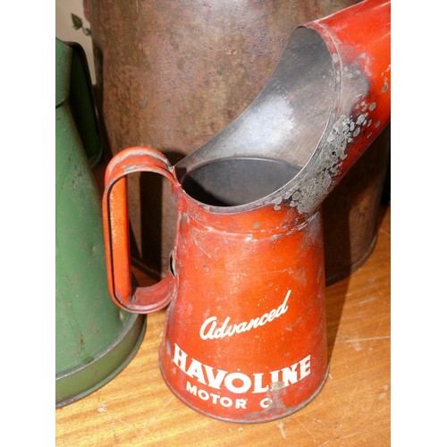 308 - A Havoline motor oil advertising quart pourer jug, a green half gallon pourer jug and a large vintag... 