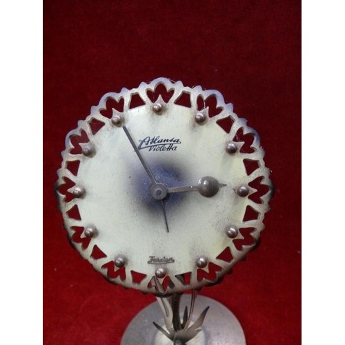 318C - Vintage Richard Rau Atlanta Violetta flower shaped novelty clock. Needs attention.