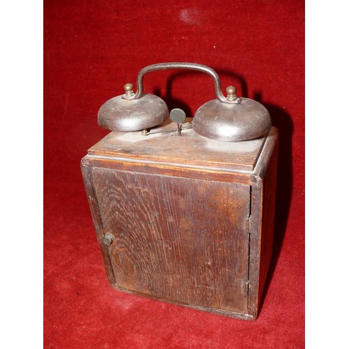 318A - Early 20thC wind up alarm clock, oak case with a second dial and striking bells on top. WORKING.