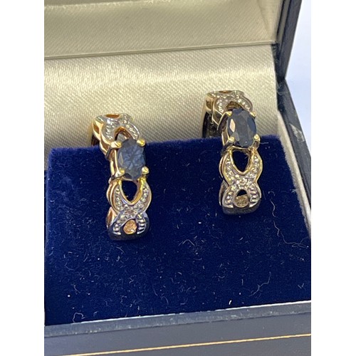 37 - A PAIR OF SAPPHIRE AND WHITE STONE EARRINGS