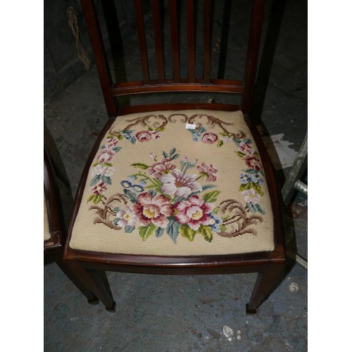 422 - A pair of Victorian mahogany dining chairs, with drop in needlepoint seats.