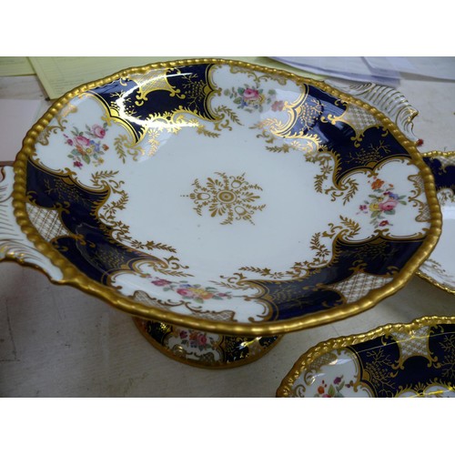 59 - Coalport Batwing Panel cobalt blue tableware. Set of 12 dinner plates, compote/tazza, bread and cake... 