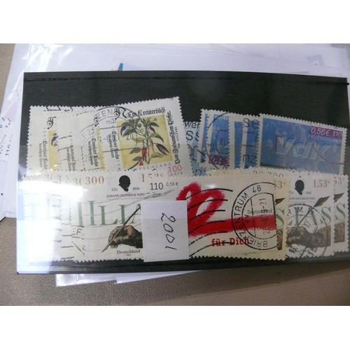 406 - A large quantity of vintage franked German postage stamps - 1997-2010.