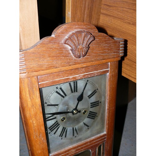 313B - Early 20thC glazed oak case mechanical wall clock with pendulum and winding key.